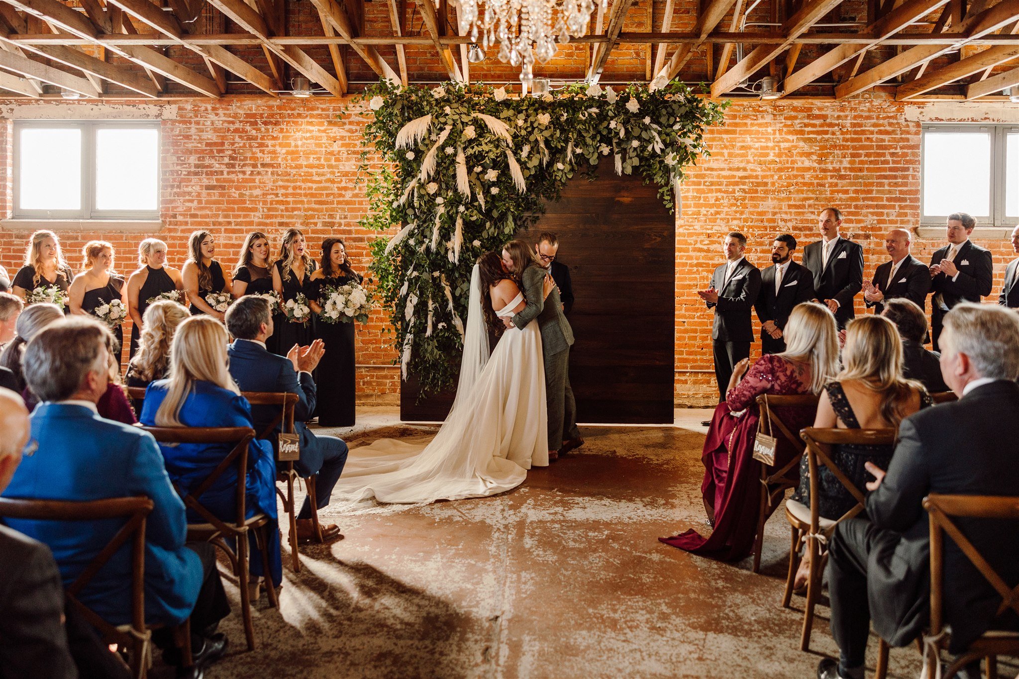 bride and groom kissing at wedding ceremony at the St Vrain, Longmont, Colorado