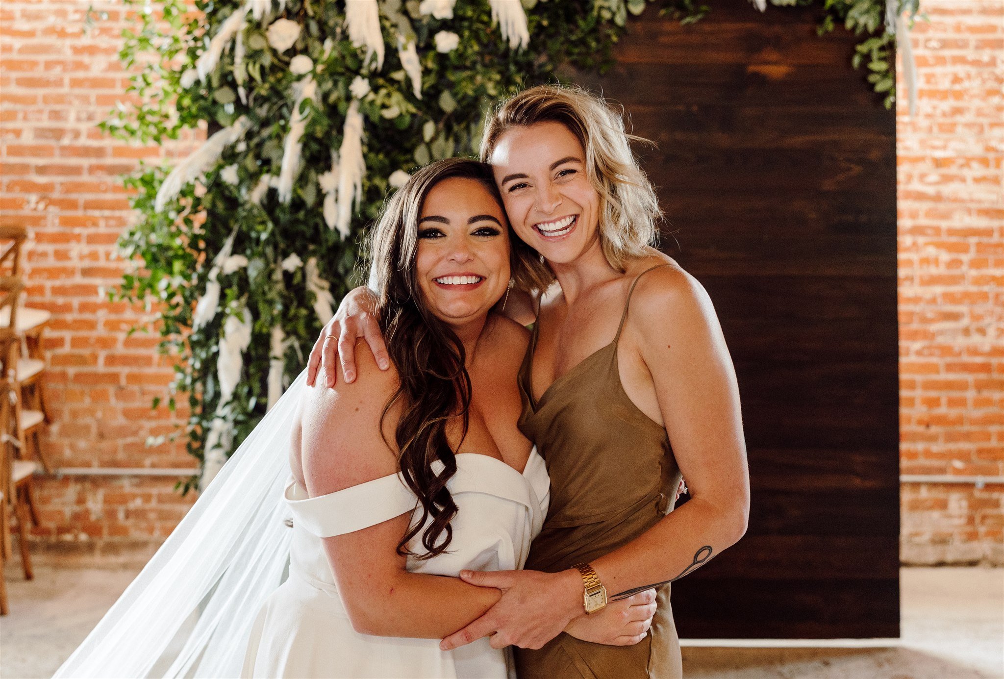 Bride with her bespoke wedding dress designer at the St Vrain wedding venue in Longmont, Colorado