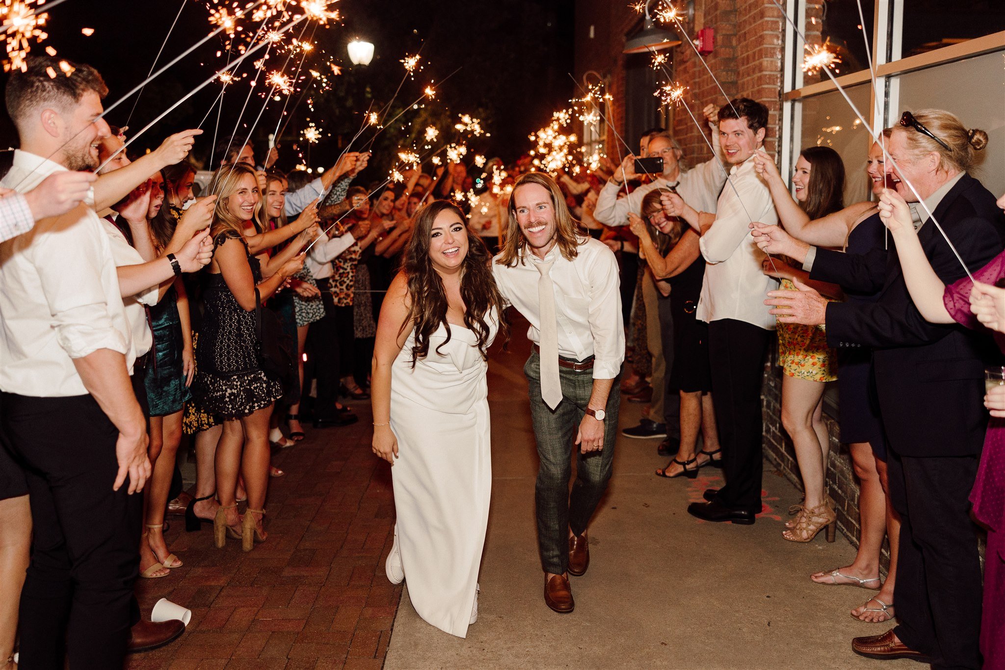 Bride and groom with sparkler exit at the St vrain wedding venue in Longmont, Colorado