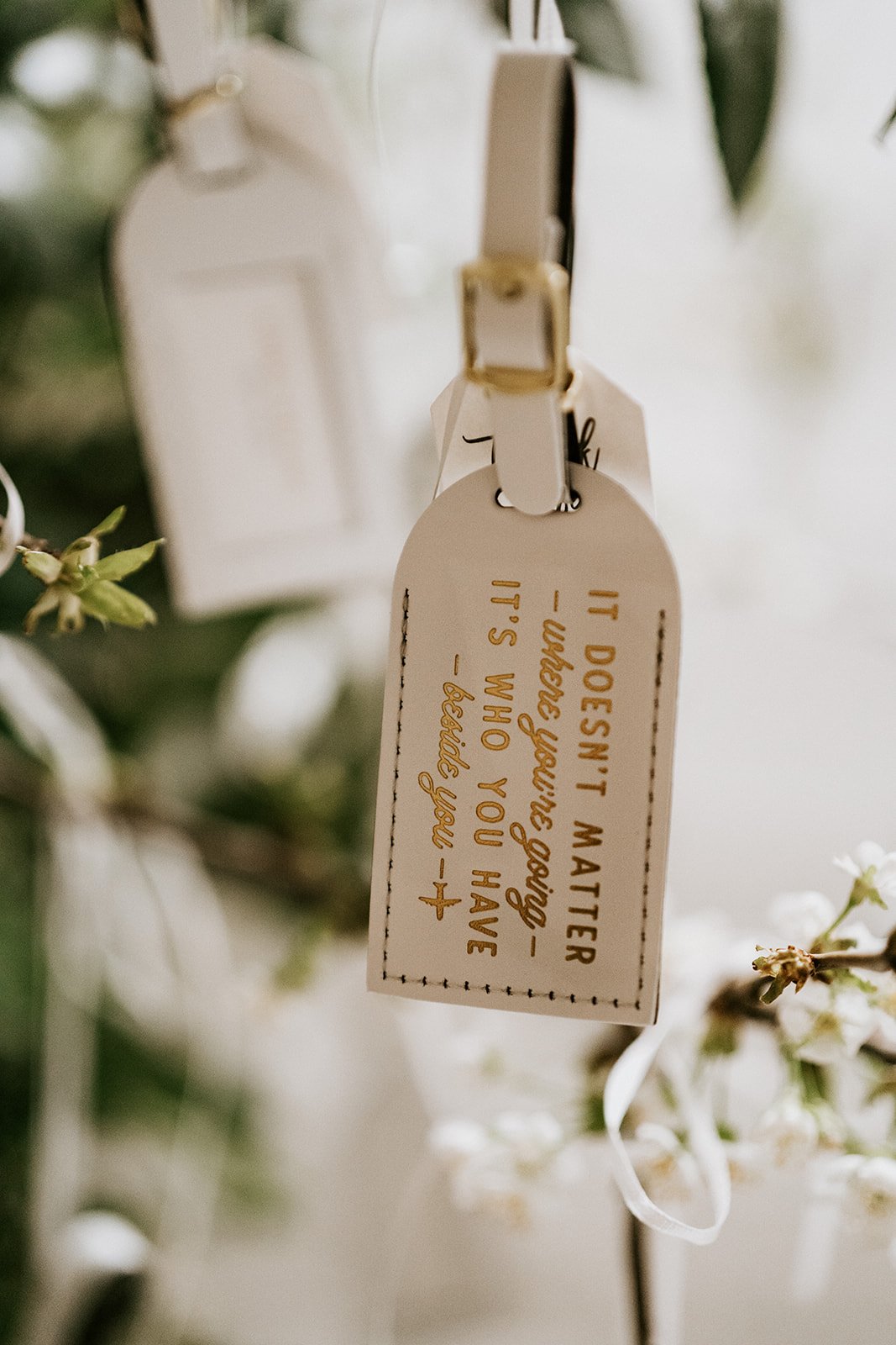 Wedding luggage tag for wedding favor and escort card idea at the St Vrain wedding venue in Boulder County.